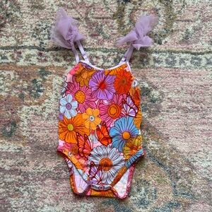 Posh peanut tulle strap onesie